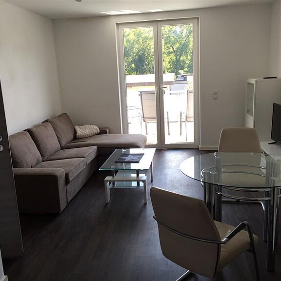 Wohnzimmer mit Essbereich Wohnung 1. Obergeschoß