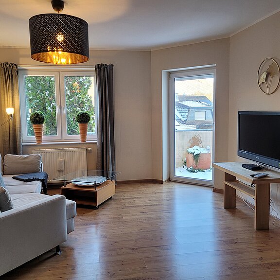 Wohnzimmer mit Terrasse