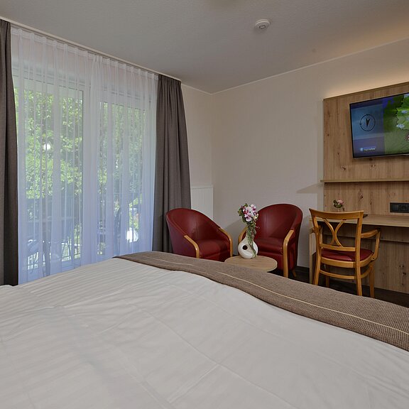 Zimmer Post Meister mit Balkon