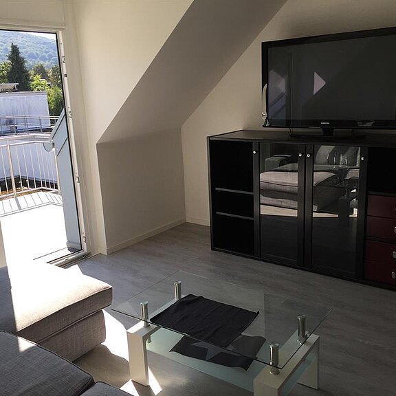 Wohnzimmer mit Balkon südlich Obergeschoß